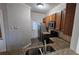 Well-equipped kitchen featuring granite counters, stainless steel appliances, and a backyard view at 115 Sunset Ln, Woodstock, GA 30189
