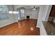 Spacious living room boasting hardwood floors, a fireplace, and natural light at 115 Sunset Ln, Woodstock, GA 30189