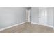 Bedroom featuring neutral-colored walls, carpet, trim, and a white door at 3313 Alhambra Cir, Hampton, GA 30228