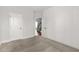 A well-lit bedroom showcasing access to stairs and a doorway at 3313 Alhambra Cir, Hampton, GA 30228