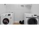 A practical laundry room with modern front-load washer and dryer at 3313 Alhambra Cir, Hampton, GA 30228