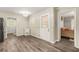 Bright dining area with new laminate flooring, neutral paint, and access to living areas at 4218 Hideaway Dr, Tucker, GA 30084