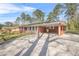 Ranch style home features a brick facade and covered carport at 4218 Hideaway Dr, Tucker, GA 30084