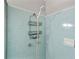 Shower featuring blue tiled walls and shower head at 4218 Hideaway Dr, Tucker, GA 30084