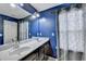 Bathroom featuring double sinks and a vanity offers a practical and stylish space at 5264 Mill Way, Stone Mountain, GA 30083