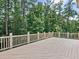 Large wooden deck perfect for enjoying the surrounding natural views and tranquility of the outdoors at 6205 Arnall Nw Ct, Acworth, GA 30101