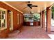 Covered patio features brick columns, built-in grill and ample space for entertaining guests at 6205 Arnall Nw Ct, Acworth, GA 30101