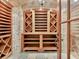 A wine cellar with wood wine racks, slate floors and accent brick walls at 6205 Arnall Nw Ct, Acworth, GA 30101