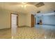 Large finished basement showcasing decorative tile flooring with doorway to bathroom at 2436 Green Hollow Ct, Conyers, GA 30012