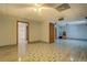 Basement featuring modern tile flooring, a ceiling fan, and easy access to a bathroom at 2436 Green Hollow Ct, Conyers, GA 30012