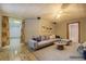 Finished basement offering a lounge area with a sofa and bathroom at 2436 Green Hollow Ct, Conyers, GA 30012