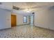 Finished basement featuring decorative tile flooring with doorways and lighting at 2436 Green Hollow Ct, Conyers, GA 30012