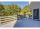 Outdoor deck with scenic view of treescape and fresh air near entrance at 2436 Green Hollow Ct, Conyers, GA 30012