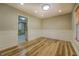 Spacious dining area with wainscoting and hardwood floors at 2436 Green Hollow Ct, Conyers, GA 30012