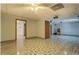 Spacious living room featuring tile flooring, neutral walls, recessed lighting, and open floor plan at 2436 Green Hollow Ct, Conyers, GA 30012