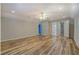 Living room featuring wood flooring, neutral walls and recessed lighting at 2436 Green Hollow Ct, Conyers, GA 30012