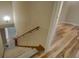Staircase and hardwood flooring leading to the upper level of the home at 2436 Green Hollow Ct, Conyers, GA 30012