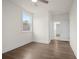 Neutral colored bedroom featuring hardwood floors, crown molding, and a large window at 2517 Canopy Ct, Marietta, GA 30066