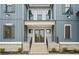 Inviting front porch with double doors, black railings and vertical siding, offering curb appeal at 2517 Canopy Ct, Marietta, GA 30066