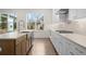 Bright kitchen showcasing countertops, kitchen island with sink, and gas stove at 2517 Canopy Ct, Marietta, GA 30066