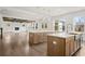 Open-concept kitchen with a large island, stainless steel sink, and hardwood flooring at 2517 Canopy Ct, Marietta, GA 30066