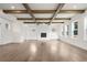 Cozy living room featuring hardwood floors, coffered ceilings, fireplace, and built-in cabinets at 2517 Canopy Ct, Marietta, GA 30066