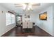 Dining room boasts hardwood floors, natural light, and views into the kitchen and living room at 275 Fern Crest Dr, Lawrenceville, GA 30046