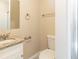 A half bathroom featuring vanity, mirror, lighting and toilet at 3716 Loren Dr, Decatur, GA 30032