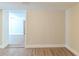 An inviting bedroom offering stylish flooring with a doorway leading to adjacent room at 3716 Loren Dr, Decatur, GA 30032