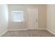 A bright bedroom with a large window with blinds providing natural light and privacy at 3716 Loren Dr, Decatur, GA 30032