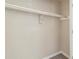 A standard closet with a shelf and rod for hanging clothes, ready for organization at 3716 Loren Dr, Decatur, GA 30032