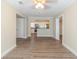 Bright open-concept living room featuring wood floors and a view into a modern kitchen at 3716 Loren Dr, Decatur, GA 30032