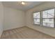 Cozy bedroom with soft carpet, and natural light from the large windows at 3856 Allegretto Cir, Atlanta, GA 30339