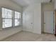 Bright bedroom featuring neutral carpet, and a window with horizontal blinds at 3856 Allegretto Cir, Atlanta, GA 30339