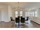 Spacious dining room featuring modern chandelier and furniture with an open floor plan at 3856 Allegretto Cir, Atlanta, GA 30339