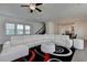 Well-lit living room space flows seamlessly into the open kitchen and dining areas at 3856 Allegretto Cir, Atlanta, GA 30339