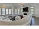 Spacious living room boasts a fireplace, dark floors and plenty of natural light at 3856 Allegretto Cir, Atlanta, GA 30339