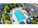 Aerial view of a sparkling pool with lounge chairs, perfect for relaxation and recreation at 3856 Allegretto Cir, Atlanta, GA 30339