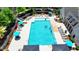 Aerial view of a sparkling pool with lounge chairs, perfect for relaxation and recreation at 3856 Allegretto Cir, Atlanta, GA 30339