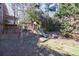 Shaded backyard with swing set and mature trees at 6507 Bennington Dr, Tucker, GA 30084