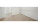 A spacious walk-in closet provides ample storage with wire shelving and neutral carpeting at 1151 Nash Lee Sw Dr, Lilburn, GA 30047