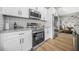 Close up on modern kitchen appliances and granite countertops at 395 W Lake Nw Ave, Atlanta, GA 30318