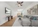 Spacious living room with modern decor, hardwood floors, and recessed lighting at 395 W Lake Nw Ave, Atlanta, GA 30318