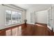 Office with hardwood flooring, a large window, and glass french doors at 5955 Princeton Run Trl, Tucker, GA 30084