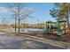 View of a community playground and tennis courts at 5955 Princeton Run Trl, Tucker, GA 30084