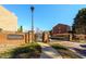 Welcoming entrance to the Cambridge community with brick signage, manicured landscaping, and a secure gated entry at 699 Coligny Ct, Atlanta, GA 30350