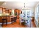 Charming kitchen with granite counters, stainless appliances and adjacent breakfast area at 160 Edgewater Trl, Fayetteville, GA 30215