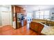 Modern kitchen with stainless steel refrigerator and an adjacent breakfast nook at 160 Edgewater Trl, Fayetteville, GA 30215