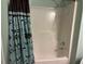 Bathroom with a shower/tub combo and a shower curtain at 4312 Defoors Farm Trl, Powder Springs, GA 30127