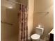 Full bathroom with a shower and a toilet at 4312 Defoors Farm Trl, Powder Springs, GA 30127